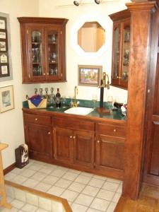 Base cabinet used to create the unique bottle cap bar.