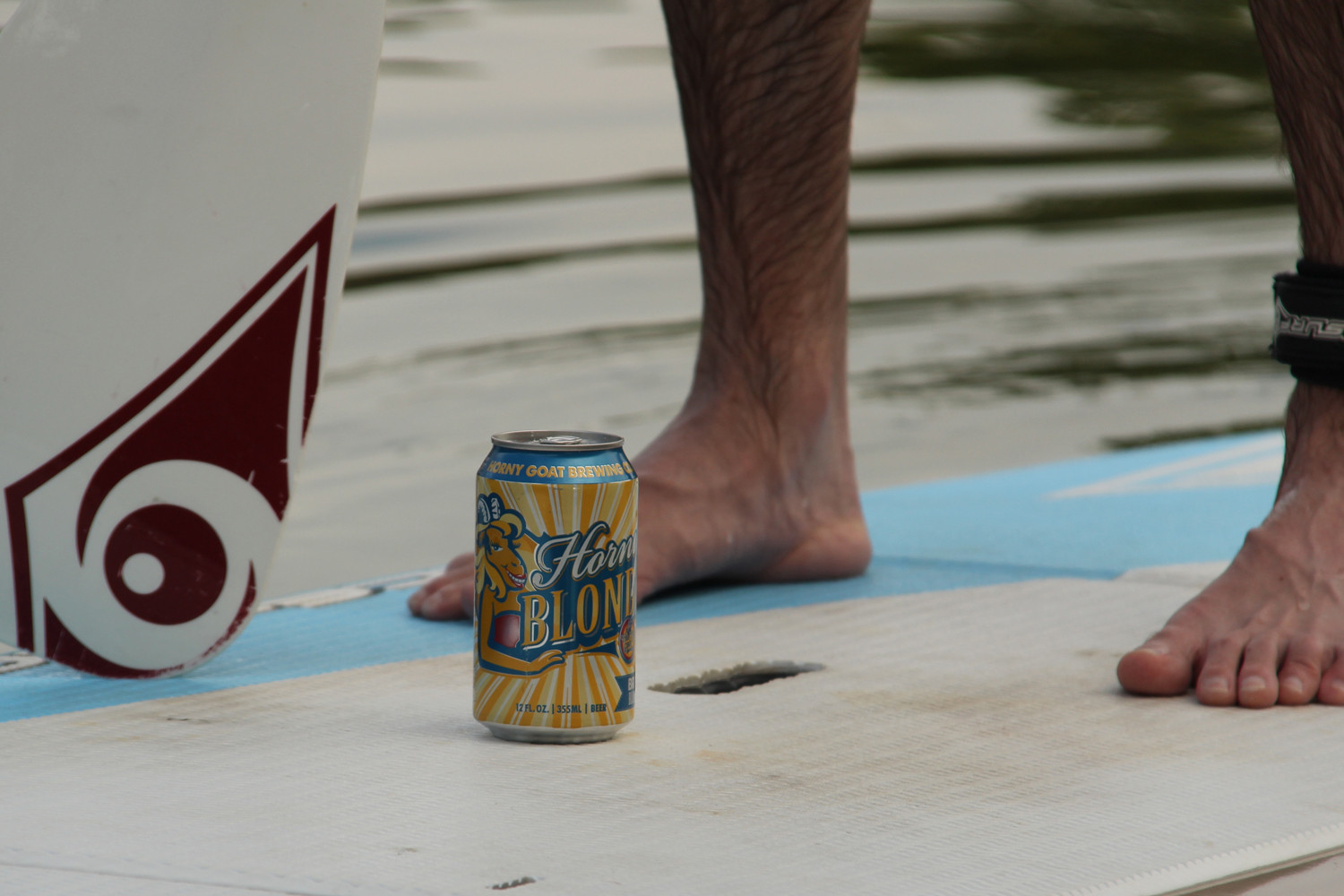 Horny Goat Blonde beer is great for summer paddle boarding.