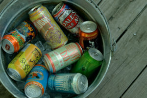 Summer beer cans can are easily transported and recycled.