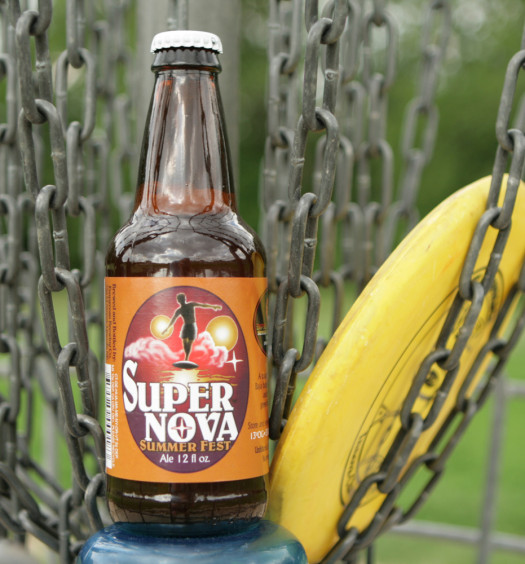 Find Super Nova summer beer on the disc golf course.