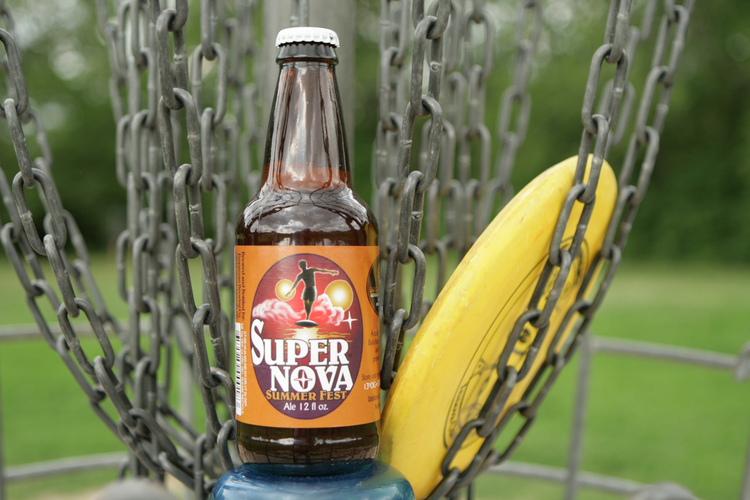 Find Super Nova summer beer on the disc golf course. 